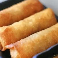 Fried Veggies  Egg Rolls. · Egg Rolls - golden fried rice paper wrapped with mixed vegetables and glass noodle. Served w...