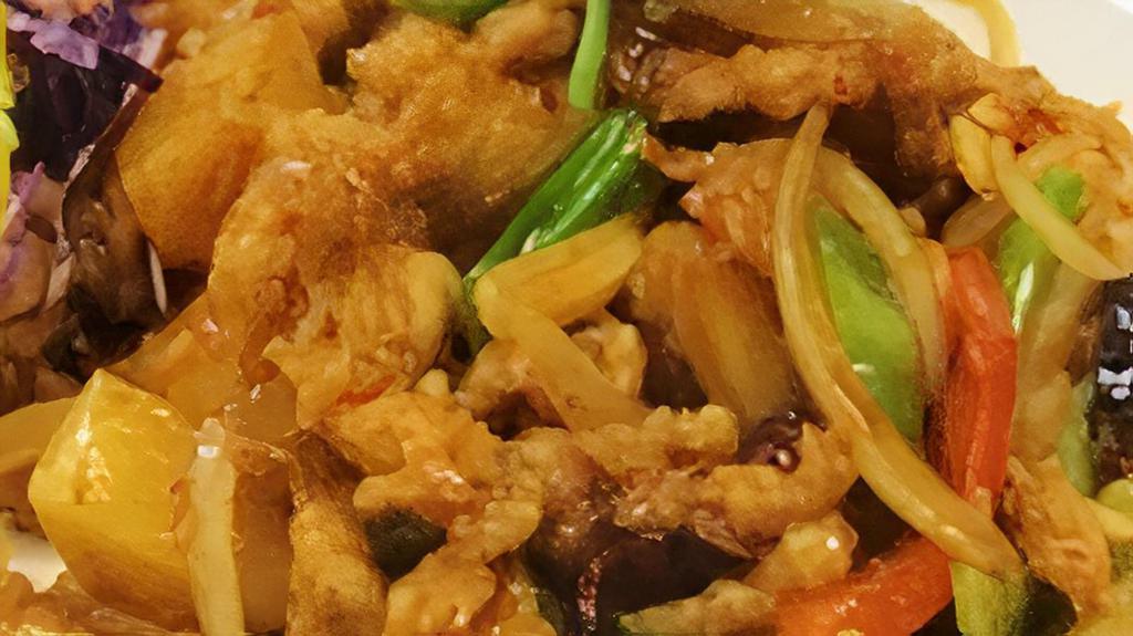 Thai Chili Chicken. · Crispy fried chicken strips then stir-fried with homemade chili sauce, pineapple, chunks, bell peppers, onions, green onion, roasted cashew nut and roasted chili.