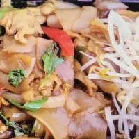 Pad Kee Mao. · Drunken Noodle - Fresh wide noodle stir-fried with choice of meat, egg. Green onions, bell p...