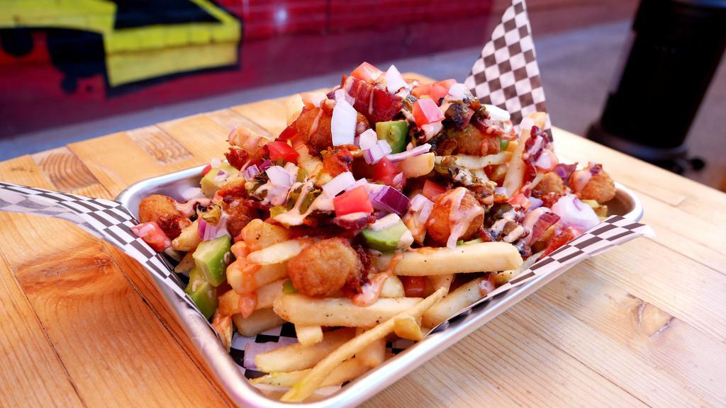 Dirty Fries · A big pile of crispy fries loaded with avocado, bacon, special sauce, green chile, red onions, and diced tomatoes. Bring your friends, you're gonna need 'em.