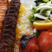 Mixed Kebab Platter · Ground beef and chicken breast skewers. Served with rice and salad.