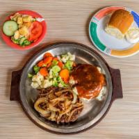 Ground Beef Steak (1/2 Lb) · Ground beef topped with grilled onions and served with steamed vegetables and your choice of...