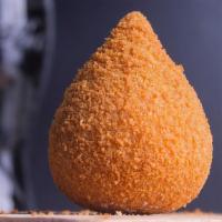 Coxinha · A traditional brazilian appetizer made with wheat dough filled with shredded chicken and dee...