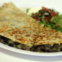 Meat Quesadilla  · Flour Tortilla Melted Cheese, Your choice of Meat. (Chicken, Beef, Pork)
Sour Cream & pico D...