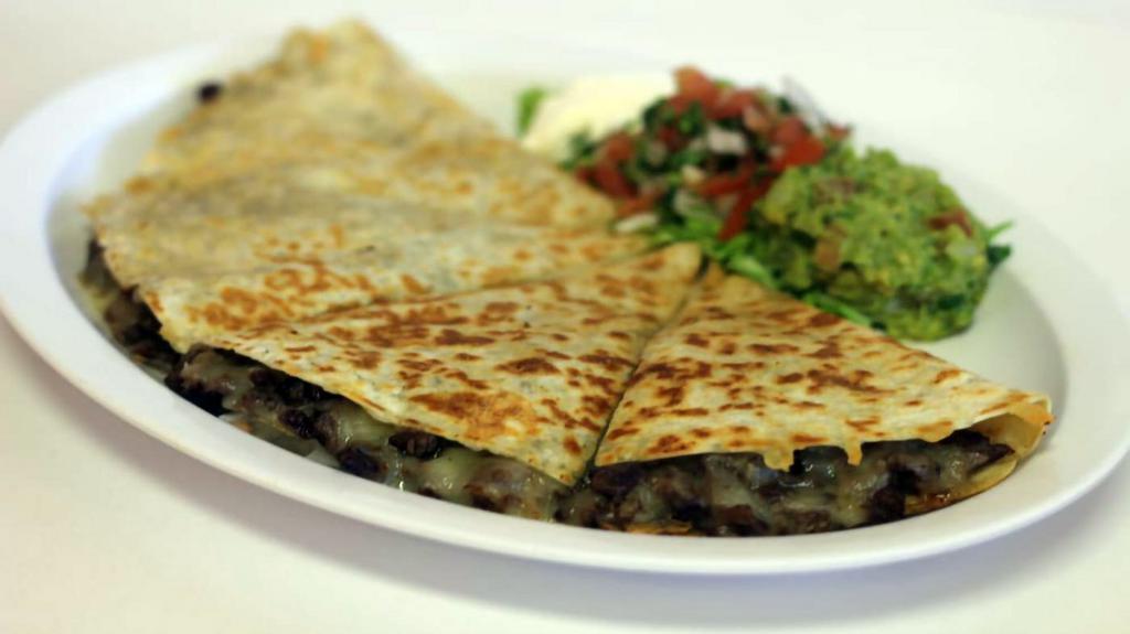 Meat Quesadilla  · Flour Tortilla Melted Cheese, Your choice of Meat. (Chicken, Beef, Pork)
Sour Cream & pico De Gallo