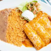 Enchiladas · Choice of meat in a green or red sauce. Served with rice and beans.