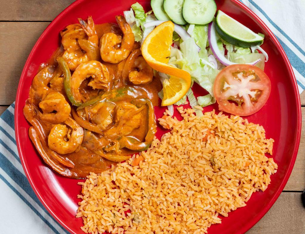 Camarones A La Diabla · Shrimp cooked in a fiery red spicy salsa. Served with rice, salad and beans.
