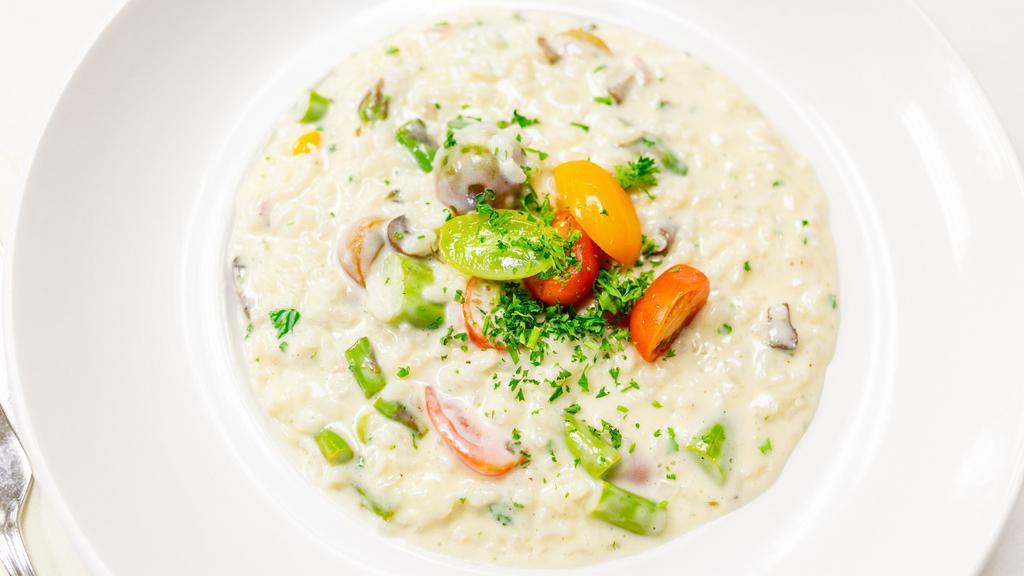 Asparagus & Cheese Risotto · Arborio rice, asparagus, heirloom cherry tomatoes, cheese blend.