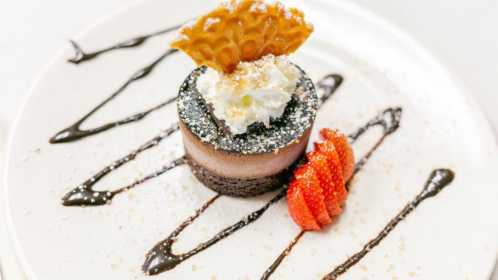 Chocolate Truffle Marquise · Dark truffle mousse accented with chocolate and hazelnut