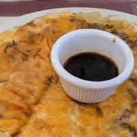 Fusion Pancake · Rice and veggies in a special prepared batter, with cheese.