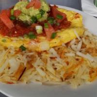 Spanish Omelet · Peppers, onion, tomato and cheese.