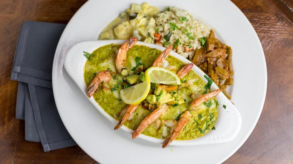Sinaloa Shrimp Culichi · Gluten free. Grilled tail-on shrimp in a creamy poblano and garlic Verde sauce with queso casero served with calabacitas, arroz Blanco and house-made nopalitos.