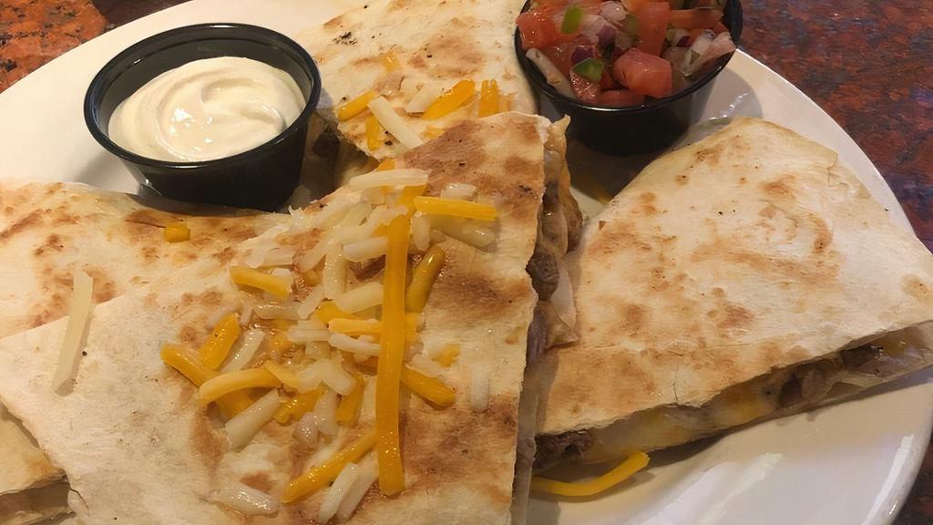Steak Quesadilla · *Consuming raw or undercooked meats, poultry, seafood, shellfish, or eggs may increase your risk of foodborne illness, especially if you have certain medical conditions.