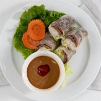 Summer Roll - Gỏi Cuốn (2 Roll) · Lettuce, pork, shrimp, vermicelli wrapped in rice paper, and served with peanut sauce.