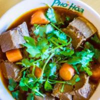  Viet Beef Stew (Phở Bò Kho) · Vietnamese beef stew served with pho noodles, chunks of beef brisket, and carrots.