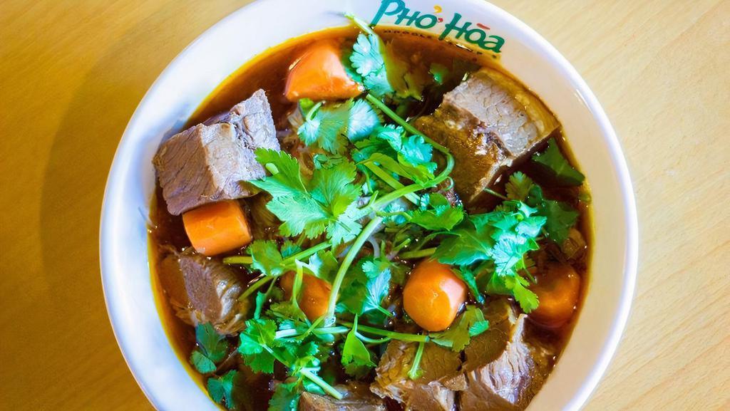  Viet Beef Stew (Phở Bò Kho) · Vietnamese beef stew served with pho noodles, chunks of beef brisket, and carrots.