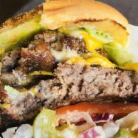 Zip Royale · Loaded with two patties, bun is dressed with zippy’s secret sauce, lettuce, tomato, red onio...