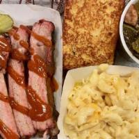 Ribs Platter, Large (6) · Six St. Louis style spare rib, Complemented by our house made sweet and tangy BBQ sauce and ...