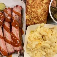 Ribs Platter, Small (4) · Four St. Louis style spare rib, Complemented by our house made sweet and tangy BBQ sauce and...