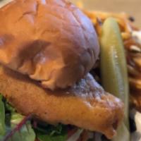 Fish Sandwich With Fries · Beer batter, mixed greens, tomatoes, tartar sauce, served with fries.