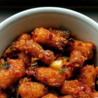 Baby Corn Manchurian · Baby corn tossed in our famous Manchurian sauce.
