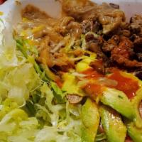 Carnitas Combo · Lettuce, Beans, Rice, Tortillas and Avocado.