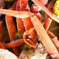 Snow Crab One Pound · COOKED IN YOUR CHOICE OF ONE OF OUR SIGNATURE SAUCES SERVED WITH TOASTED GARLIC SOURDOUGH!!!