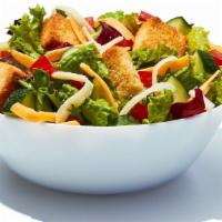 Side Garden Salad · Mix of romaine and iceberg lettuce with tomato, cucumber, cheddar, and monterey cheese, crou...