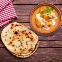 Creamy Butter Chicken & Naan Bread  · Well flavored and mildly spiced cooked chicken in tandoor and simmered in silky tomato gravy...