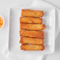 Crispy Spring Rolls · Mixed vegetables wrapped in an egg roll wrapper, then deep-fried served with our homemade pl...