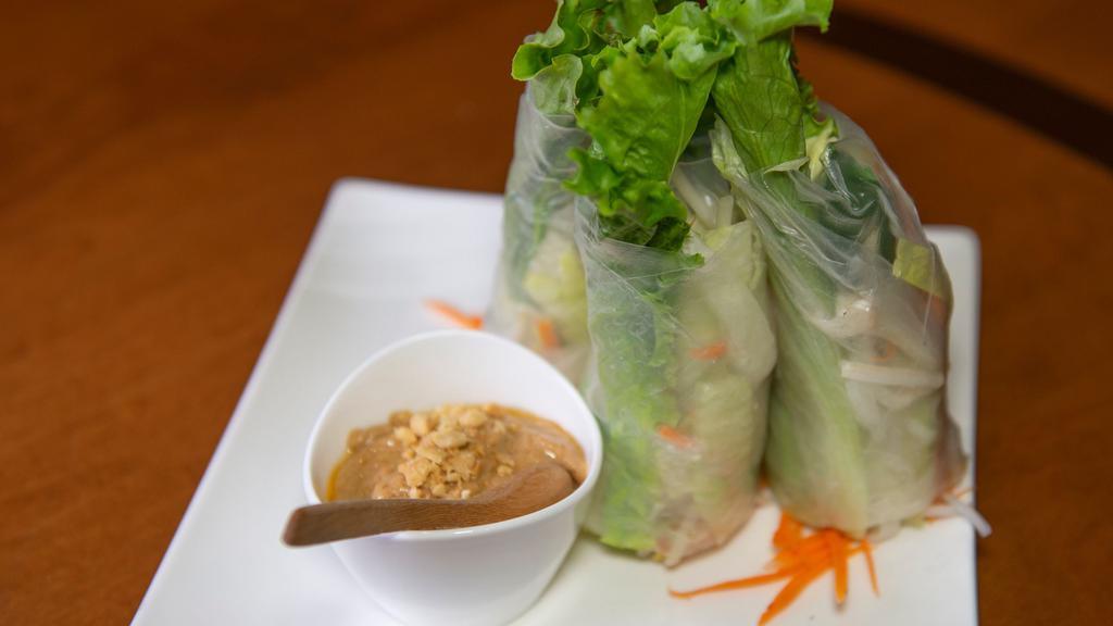Fresh Salad Rolls · Fresh mixed vegetables and small rice noodle wrapped in rice paper served with our homemade peanut sauce.