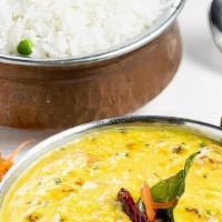 Dal Tadka · (GF). (Can be made Vegan upon request). Simmered yellow split lentils tempered with cumin, m...