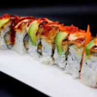 Dragon Roll · Crab salad, shrimp tempura, topped with eel, avocado, unagi sauce, spicy sauce, masago.