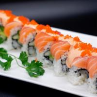 Rock'N Roll · Avocado, cucumber, topped with salmon, tuna, spicy sauce, masago.
