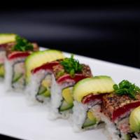 Tataki Roll · Crab salad, avocado, cucumber, topped with pepper tuna, avocado, ponzu, green onion.