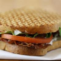 Blt Sandwich · Crisp smoky bacon, ripe tomatoes, and romaine
lettuce. Toasted in our panini grill.