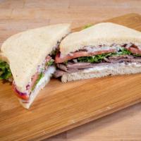 Pepper Bleu Roast Beef Sandwich · Bleu cheese spread, roast beef, green leaf lettuce, tomato, red onion and pepper on your cho...
