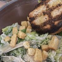 Caesar Salad · Baby gem lettuce, house made parmesan crisp, grilled sourdough, Caesar dressing, anchovy.