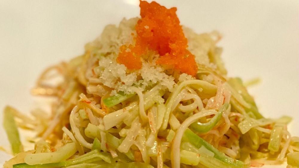 Kani Salad · Spicy. Crab meat, cucumber, tobiko, spicy mayo topped with tempura crunch