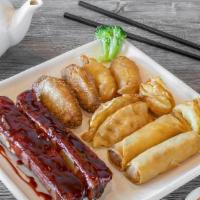 Wild Ginger Platter · Spring rolls | crab rangoon | BBQ ribs | potstickers | chicken wings | fried shrimp