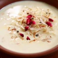 Rice Kheer · Aka Rice pudding made by boiling milk and sugar with rice and is flavoured with cardamom, pi...