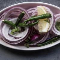Desi Salad · sliced onions and chillies tossed with indian spices