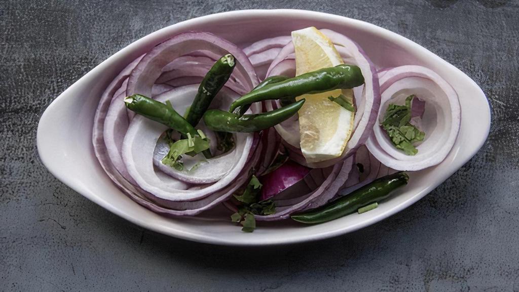 Desi Salad · sliced onions and chillies tossed with indian spices
