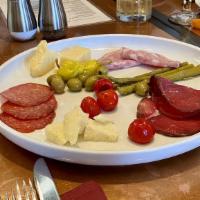 Antipasti Plate · Chef's selection of Italian meats, cheeses, and vegetables.