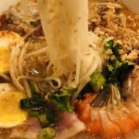 Tom Yum Noodles Soup · Thai lemongrass soup serve with choice of chicken, steam broccoli, red onion.