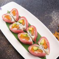 Sweet Heart Roll · Spicy salmon and avocado inside, topped with tuna.

*Consuming raw or undercooked meats, pou...