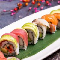 Rainbow Roll · California roll inside, topped with four pieces of assorted raw fish and avocado.

*Consumin...
