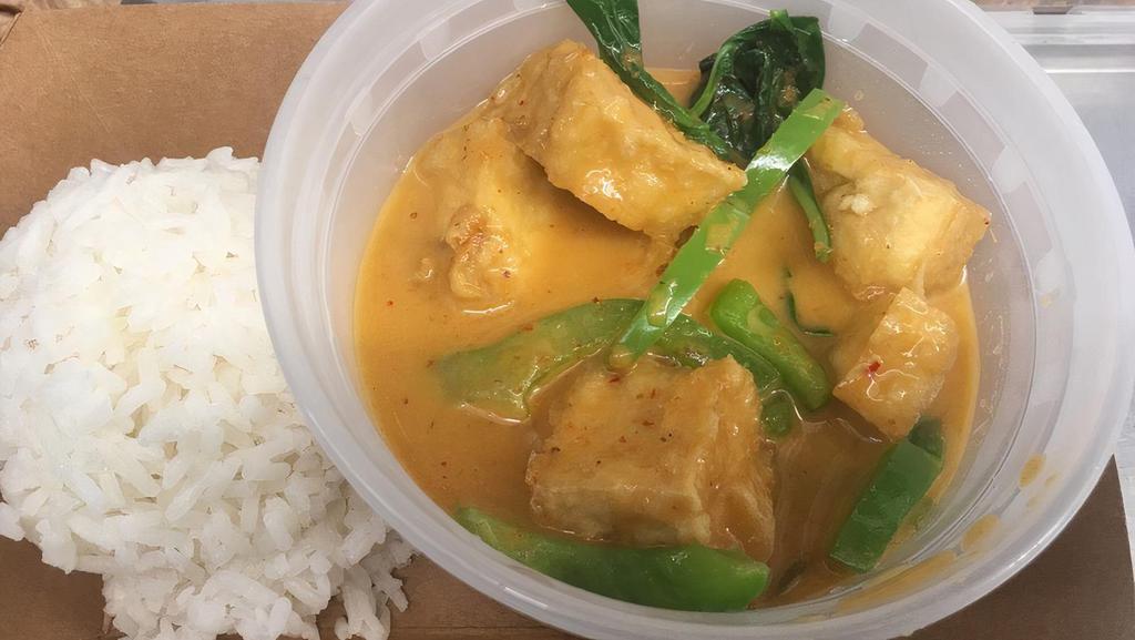 Panang Curry · Creamy panang curry with coconut milk, lime leaves, bell peppers, and sweet basil with choice of protein.