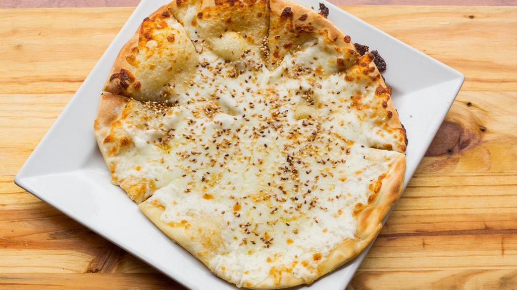 Cheese Pie · Not gluten-free. Pizza dough topped with mozzarella and olive oil.