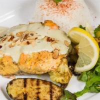Grilled Salmon · Wild Grilled Salmon fillet marinated in garlic, dill, honey and lemon zest served with grill...
